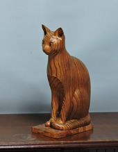 Ă钊ۓIȖؒ̔L@sitting abstract wood carved cat